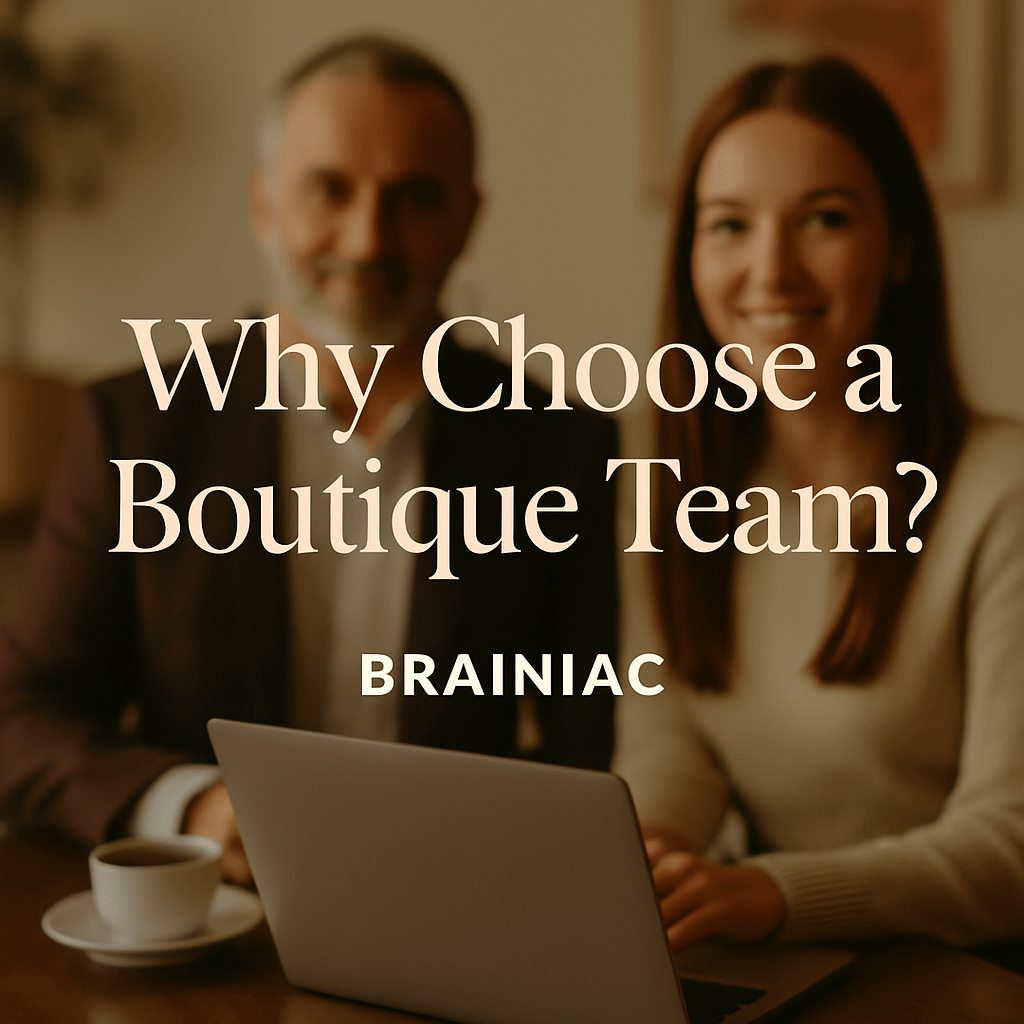 Two smiling professionals in a warmly lit office with a laptop and coffee cup, overlaid with the text “Why Choose a Boutique Team – Brainiac.