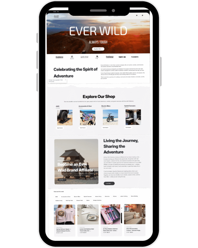 Ever Wild Outdoors website homepage displayed on a mobile phone showing adventure gear store, caravan products, 4WD accessories, and outdoor lifestyle branding.